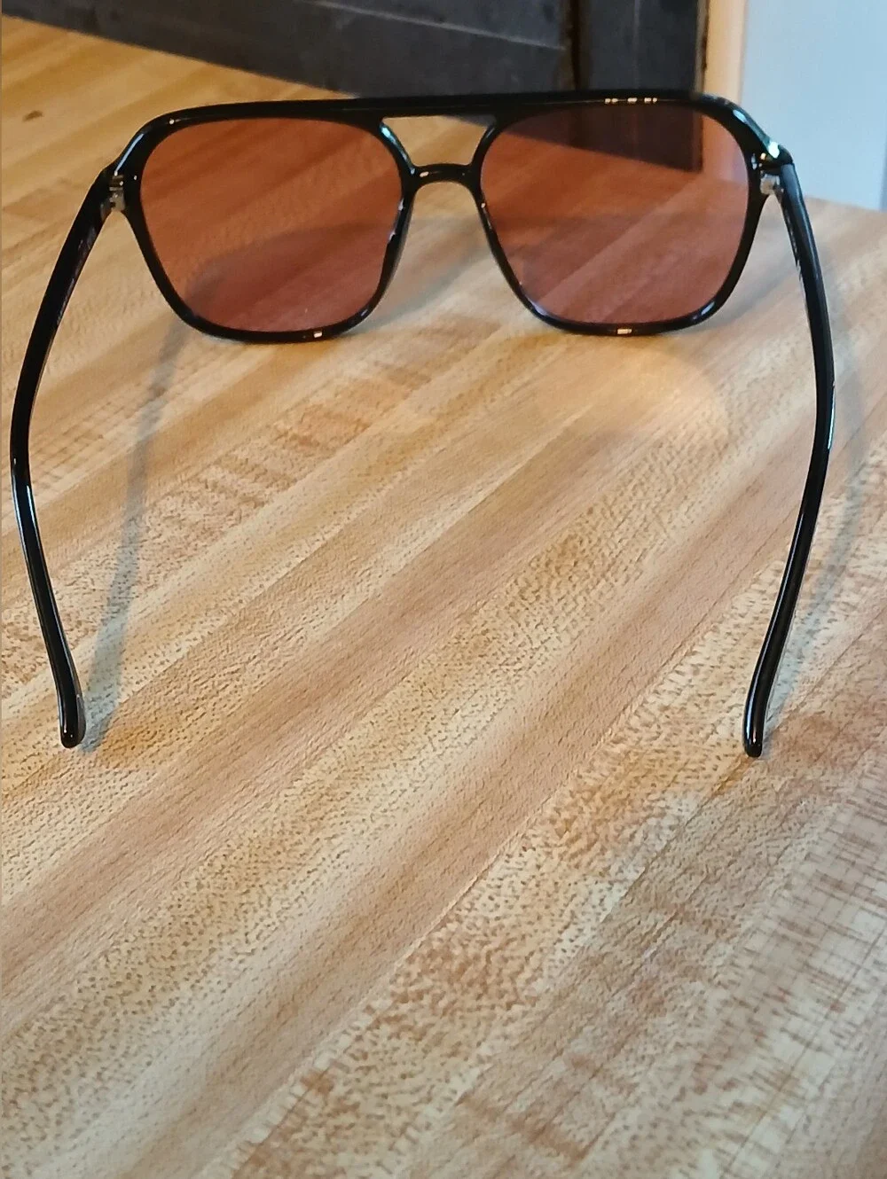 Kurt Geiger Black Frame Sunglasses with Pink Lenses
